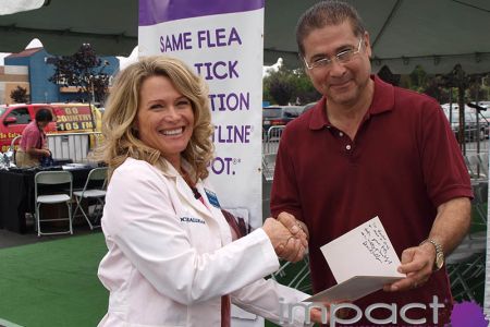Animal Planet host speaks at Pet Armor consumer activation & pet adoption event at Walmart