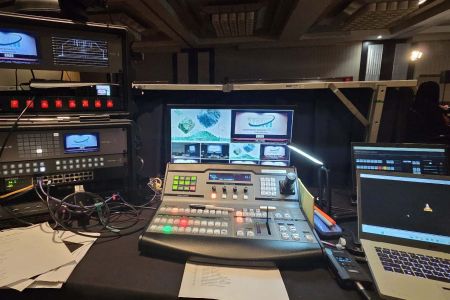 Blackmagic video switcher cutting corporate presentation