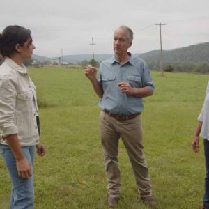 Host Kevin Durkin and Kathryn Crowley discuss architectural renovation plans on location, illustrating the collaborative design process required to modernize historic properties while respecting their original heritage.