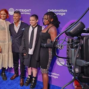 The cast of Star Trek: Discovery posing on the blue carpet at the Outright International Celebration of Courage Gala